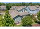 Charming backyard featuring a patio, outdoor seating, a fire pit, and screened in porch at 10822 Brandie Meadow Ln, Huntersville, NC 28078