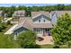 Charming backyard featuring a patio, outdoor seating, a fire pit, and screened in porch at 10822 Brandie Meadow Ln, Huntersville, NC 28078