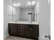 Bathroom with a double sink vanity and large mirror perfect for getting ready at 10822 Brandie Meadow Ln, Huntersville, NC 28078