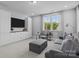 A modern living room includes a large sectional sofa and a big screen tv and natural light at 10822 Brandie Meadow Ln, Huntersville, NC 28078
