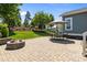 The outdoor patio and fire pit provide a relaxing space for entertaining and backyard barbeques at 10822 Brandie Meadow Ln, Huntersville, NC 28078