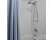 The bathroom includes an updated shower with a modern shower head at 10822 Brandie Meadow Ln, Huntersville, NC 28078