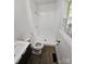 Bathroom featuring a tile shower with new fixtures, modern toilet and vanity, and a window at 1109 Reid Harkey Rd, Matthews, NC 28105