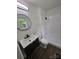 Bathroom featuring a sink, toilet, and shower stall at 1109 Reid Harkey Rd, Matthews, NC 28105
