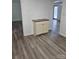 Dining area with wooden floors, a built-in cabinet and a view to other rooms at 1109 Reid Harkey Rd, Matthews, NC 28105