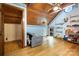 Finished attic space with wood ceiling, nautical-themed decor, built-in shelving, and plenty of room for relaxing and storage at 1160 Walton Pl, Salisbury, NC 28146