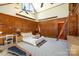 A bright bedroom with wood paneling is enhanced by the tall ceilings and windows and provides a cozy atmosphere at 1160 Walton Pl, Salisbury, NC 28146