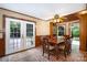Charming breakfast nook featuring brick flooring and views of the backyard at 1160 Walton Pl, Salisbury, NC 28146
