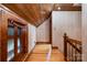 Second-floor hallway featuring wood ceiling, hardwood floor, and natural light at 1160 Walton Pl, Salisbury, NC 28146