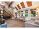Bright living room featuring brick floors, vaulted ceilings, and staircase to the second floor at 1160 Walton Pl, Salisbury, NC 28146
