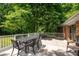 Outdoor deck area with a dining table and chairs, perfect for relaxing or entertaining at 13030 Mayes Rd, Huntersville, NC 28078