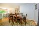 Dining room with hardwood floors that is open to other living areas at 13030 Mayes Rd, Huntersville, NC 28078