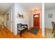 Inviting entryway with hardwood floors and a stained wood door and traditional decor at 13030 Mayes Rd, Huntersville, NC 28078