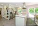 Charming kitchen with stainless steel appliances, granite counters, and a farmhouse sink at 13030 Mayes Rd, Huntersville, NC 28078