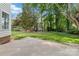 Enjoy this home's generous backyard with mature trees, a storage shed, and plenty of green space at 1308 Pennington Nw Pl, Concord, NC 28027