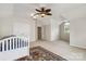 Bedroom featuring vaulted ceilings, ceiling fan, a large bed, and an area rug at 1308 Pennington Nw Pl, Concord, NC 28027