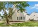The home features a spacious yard and neutral siding, creating a welcoming outdoor ambiance at 1308 Pennington Nw Pl, Concord, NC 28027