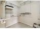 Walk-in closet with white wire shelving on multiple levels, providing ample storage at 1308 Pennington Nw Pl, Concord, NC 28027