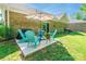 Relaxing backyard with patio seating and a grill, perfect for outdoor gatherings at 137 Ole Eastpointe Dr, York, SC 29745