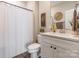 Bright bathroom featuring a white vanity, modern fixtures, and decorative accents at 137 Ole Eastpointe Dr, York, SC 29745