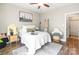 Bedroom with bright walls featuring a large window and hardwood floors at 137 Ole Eastpointe Dr, York, SC 29745