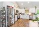 Modern kitchen with stainless steel appliances, white cabinets, and ample counter space at 137 Ole Eastpointe Dr, York, SC 29745