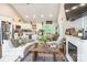 Open living area with a fireplace flowing into a modern kitchen, perfect for entertaining and Gathering life at 137 Ole Eastpointe Dr, York, SC 29745