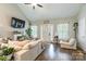 Inviting living room with vaulted ceilings and fireplace, creating a cozy and stylish gathering space at 137 Ole Eastpointe Dr, York, SC 29745