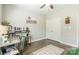 Office featuring a built-in bookshelf, hardwood floors, and a large window at 137 Ole Eastpointe Dr, York, SC 29745