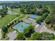Overhead shot of tennis courts, a golf course, and green landscaping in a residential area at 140 Lightship Dr, Mooresville, NC 28117
