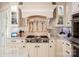 Gourmet kitchen features stainless steel appliances, custom cabinetry, and marble countertops at 140 Lightship Dr, Mooresville, NC 28117