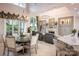 An open-concept living space with dining area and living room with fireplace at 140 Lightship Dr, Mooresville, NC 28117