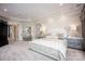 An elegant main bedroom with a tray ceiling, neutral decor, and carpeted floors at 140 Lightship Dr, Mooresville, NC 28117
