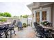 Charming outdoor patio with stylish furniture and well manicured landscaping, perfect for relaxed outdoor entertaining and dining at 140 Lightship Dr, Mooresville, NC 28117