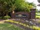 Beacon Knoll Villas community entrance with brick signage and floral landscape at 140 Villa Lake Dr, Fort Mill, SC 29708