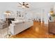 Spacious living room with hardwood floors, a fireplace, and stylish furnishings, perfect for relaxing and entertaining at 140 Villa Lake Dr, Fort Mill, SC 29708
