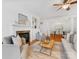 Cozy living room features a fireplace, hardwood floors, and an open layout, perfect for gatherings at 140 Villa Lake Dr, Fort Mill, SC 29708