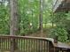 Backyard view from a deck with private and lush tree coverage at 16134 Tinura Ct # 134, Tega Cay, SC 29708