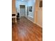 This is a large room in the basement with an open door and an off-white painted wall at 16134 Tinura Ct # 134, Tega Cay, SC 29708