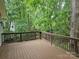 Spacious outdoor deck overlooking private wooded backyard at 16134 Tinura Ct # 134, Tega Cay, SC 29708