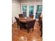 Dining area features a round table, seating for four, and hardwood flooring at 16134 Tinura Ct # 134, Tega Cay, SC 29708