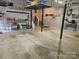 Spacious garage with ample storage shelving and room for multiple vehicles at 16134 Tinura Ct # 134, Tega Cay, SC 29708