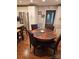 Breakfast nook with round table and chairs, kitchen counter with stools in the background at 16134 Tinura Ct # 134, Tega Cay, SC 29708