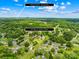 Scenic aerial view of a neighborhood with mature trees, showcasing its proximity to Downtown Gastonia, NC at 1811 Belmar Dr, Gastonia, NC 28052