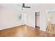 Bedroom with hardwood floors, closet, and doorway to another room at 1811 Belmar Dr, Gastonia, NC 28052