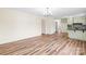 Inviting living room features beautiful hardwood floors, neutral paint, and ample natural light at 1811 Belmar Dr, Gastonia, NC 28052