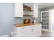 Open shelving and storage in the kitchen with white cabinets and a wood countertop at 192 Bailey Ave, Rock Hill, SC 29732