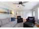 Spacious living room with comfortable seating, a ceiling fan, hardwood flooring, and closet at 192 Bailey Ave, Rock Hill, SC 29732