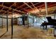 Unfinished basement with exposed ceiling, block walls, and potential for future customization at 211 Amos Homesley Rd, Cherryville, NC 28021