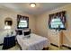 A cozy bedroom with a floral theme and natural light at 211 Amos Homesley Rd, Cherryville, NC 28021